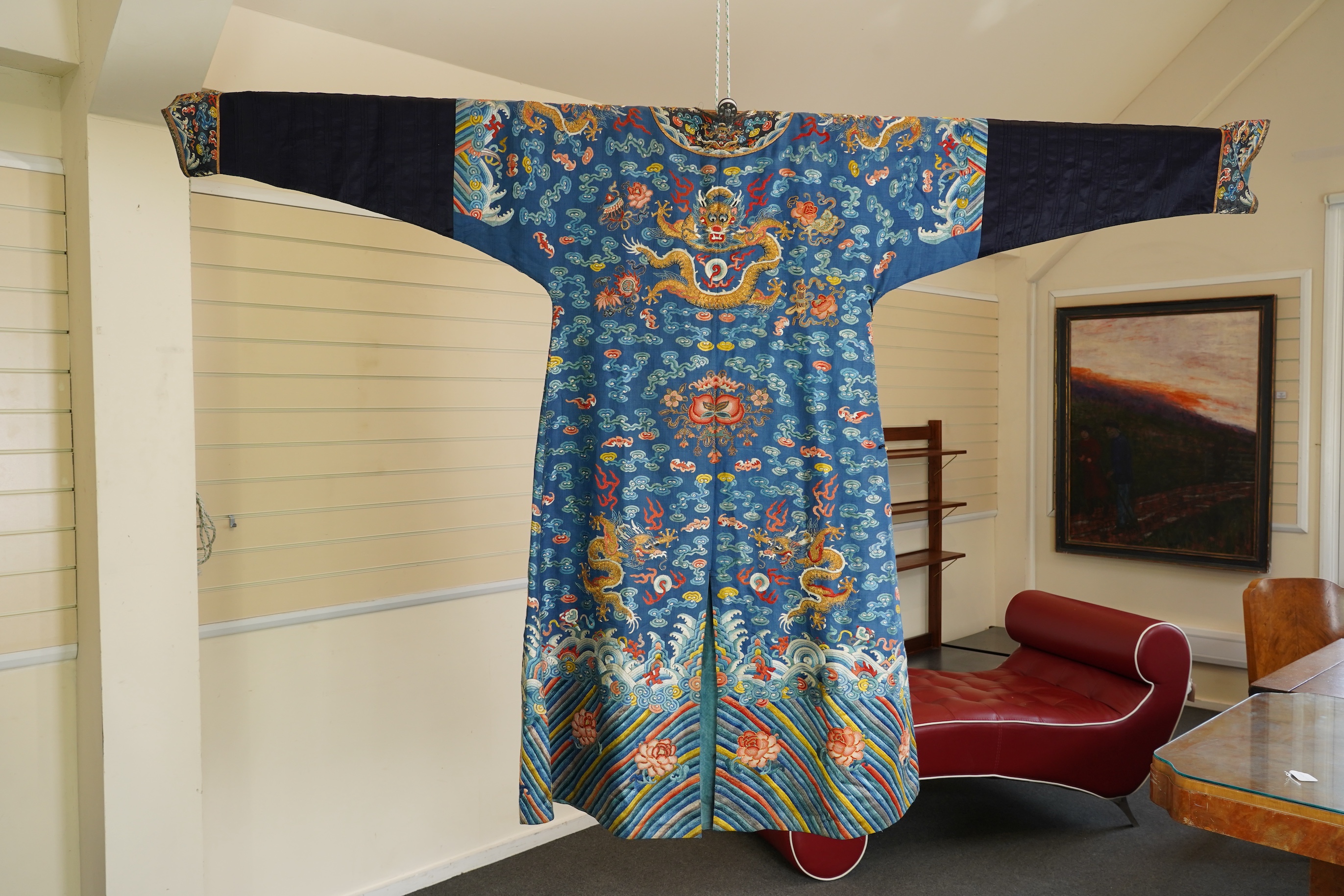 A Chinese blue silk man’s dragon robe, jifu, 19th century